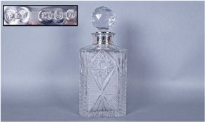 Fine Quality Cut Glass Whiskey Decanter Of Square Form with star cut to the sides & base. The