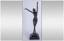 20th Century Signed Art Deco Style Bronze Figure Of A Dancer. Raised on a stepped plinth with