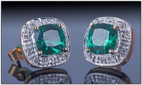 Ladies 9ct Gold Stud Earrings, Set with central square shaped emerald coloured stone surrounded by