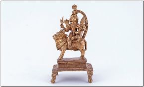 A Fine Quality Indian Bronze Figure Of A Deity Sitting On A Sacred Bull, holding a smaller God