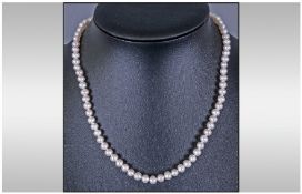 Ladies Single Strand Cultured Pearl Necklace, with 9ct gold clasp. Length 18 inches.