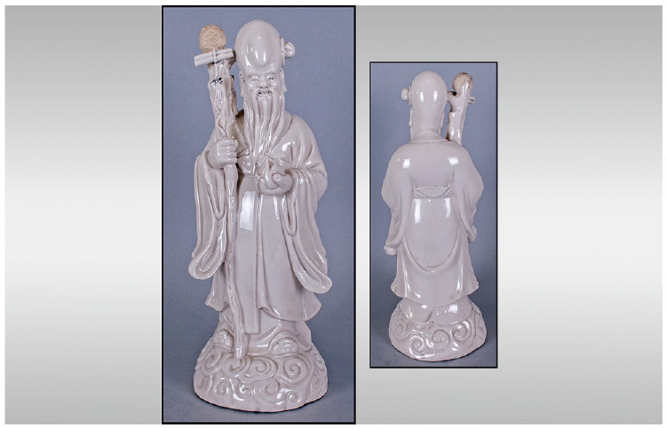 Antique Chinese Blane De Chine Figure, depicting Shoulao holding a gnarled staff and a peach. The