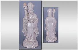 Antique Chinese Blane De Chine Figure, depicting Shoulao holding a gnarled staff and a peach. The