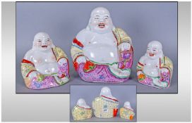 Antique Chinese Famile Rose Decorated Set Of Three Graduating Laughing Buddhas. Decorated in bright