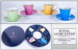 Royal Worcester Box Set Of Four Cups & Saucers, Each decorated in a bright colour with gold rim.