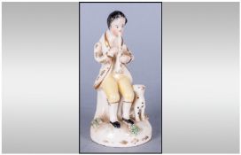 Small Early 19th Century Porcelain Figure Of A Man Playing A Flute with a dog at his side. Hollow
