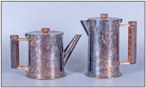 Trench Art Interest. Two silver plated shells, professionally adapted into a teapot and water jug,