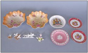 Collection Of Small China Items. Comprising bisque and gilt wedding cake decorations, pin cushion