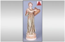 Royal Dux Figure, Classical female figure dressed on flowing robe playing a harp. Circa 1900. Pink