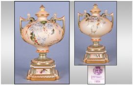 Royal Worcester Hand Painted Blush Ivory Two Handle And Lidded Urn Shaped Pedestal Vase, Date 1899.