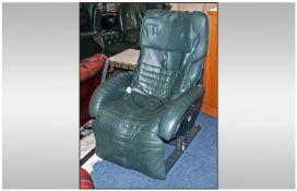 A Green leather Electric Remote Controlled Armchair, in green leather. On a plastic coated metal