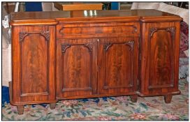 A Victorian Mahogany Four Cupboard Inverted Break Chiffonier. Has one Central Door and Rounded