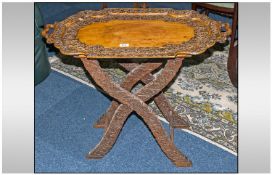 Late 19th Century Anglo-Indian Butlers Tray And Stand, the twin handled tray of shaped form,