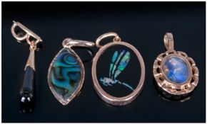 Collection Of Four Gold Opal & Onyx Pendants.
