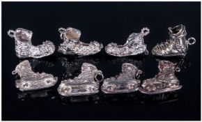 Collection of Eight Heavy Silver Shoe Charms.