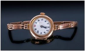 Ladies 1930`s Elegant Manual Wind 9ct Gold Circular Cased Wristwatch, fitted to a 9ct gold