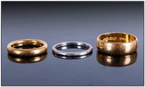 22ct Gold Wedding Bands, 2 in total. Plus a platinum wedding band. 3 rings in total. 13.5 grams in