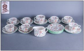 Minton `Haddon Hall` Part Dinner Service comprising large cup and saucer, milk jug, six cups,