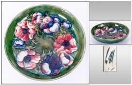 Moorcroft Anemone Pattern Shallow Bowl, a circle of red, white and purple anemones around the base