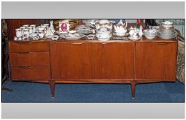 A Mackintosh Teak Sideboard, Circa 1960`s. Three cupboards to one side & three drawers to the