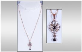 Edwardian 9ct Gold Garnet Set Pendant Drop & Chain, marked 9ct. 21`` in length.