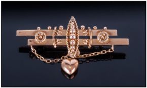 A 9ct Gold Edwardian Brooch, the brooch is period in design, an unusual beaded & rope design with a