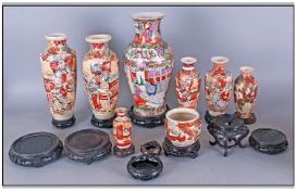 Collection Of 6 Oriental Vases & One Bowl, all on wooden plinths. Plus one other vase in the