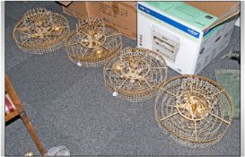 Set Of Four Contemporary Round Brass Hanging Chandeliers - Attached with Crystal Droppers to Form a
