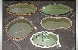 Collection Of Five 1950`s Composition Decorated Mirrors, three of oval form, one round. 18`` in