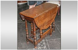 Drop Leaf Table. A Small Oak, Part 18th Century, the Top Adapted later on. Turned Baluster Legs, On
