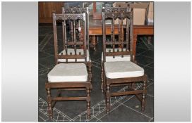Four Oak Reproduction Dining Chairs, with spindle back & cream upholstered cushions. 45`` in