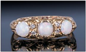 18ct Gold Opal And Diamond Dress Ring In The Victorian Style Set With Three Polished Opals Between