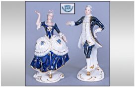 Royal Dux Pair Of Cobalt Blue And White Porcelain Figures. Circa 1930`s. Lady and gentleman