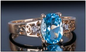 9ct Gold Diamond & Blue Topaz Ring