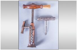 Cork Screw With Unusual Mechanism with mahogany handle, gilt iron frame, unmarked. Probably Lunds