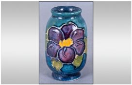 Moorcroft Miniature Clematis Pattern Vase, a single clematis flower to each side in two shades of