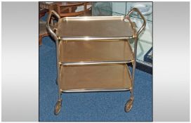 1930/40`s Gilt Tea Trolley with three loose carrying trays.