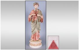 Royal Dux Hand Painted Figure, ``Male Flautist`` dressed in Roman classical dress. Circa 1900.