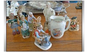 Collection Of Assorted Ceramic Figures. Various sizes and subjects. Together with water jug,