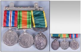 Three WW2 Medals On Bar To Include Territorial Medal For Efficient Service Stamped To Edge W.4520