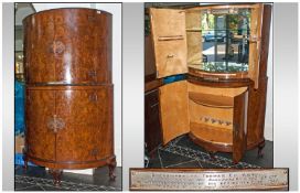 A fine Quality Burr Walnut Demi Lune Cocktail Cabinet, with Brass Fret Worked Lock Plate and