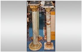 Two French Onyx Ormalu Mounted Pedestal Coloums, Both with Gilded Corinthian Capitals, One on a