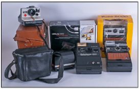 Collection of Cameras comprising Kodak ITT Magic Flash, Polaroid Supercolour 635, Polaroid land