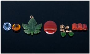 Three Pieces of New Zealand Green Stones, one in the form of a maple leaf and a pair of heart shape