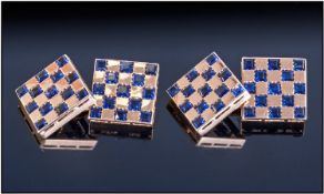 Gents 18ct Gold Cufflinks. Of square form. With Calibre cut Sapphires in a Checkered design.