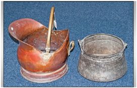 Copper Helmet Coal Scuttle. Together with a primitive copper cooking utensil.