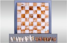 Beautifully Crafted Chess Set. Marble Board with 32 Crafted Playing Pieces. 12 inches in Diameter