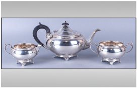 Art Deco E Viners Delux Silver Three Piece Tea Service. Comprising teapot, milk and sugar bowl.