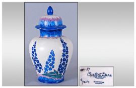 Carlton Ware Lidded Vase, Delphinium blue on white ground. Stands 7.5 inches high.