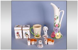 Collection Of Carlton Ware Including crested ware, tall floral cup, two church figures, two Bird